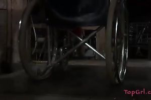 Lascivious nympho is placed into a wheeled restraint chair