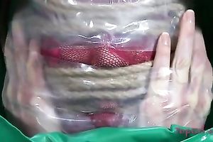 Lascivious nympho is placed into a wheeled restraint chair