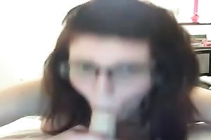 Nerdy web camera wench sucks a sextoy after pounding her muff with it