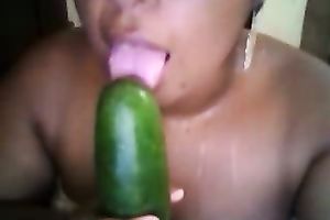 Fat Colombian nympho bonks her thick bawdy cleft with cucumber
