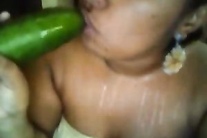 Fat Colombian nympho bonks her thick bawdy cleft with cucumber