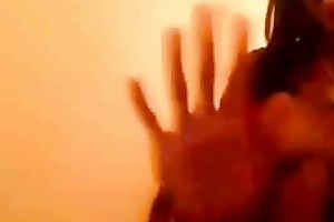 Sweet swarthy white bitch topless on cam shows her large breasts