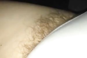Filthy brown color pubic hair sticking out of her white pants