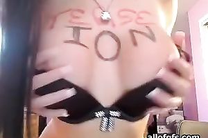 Big boobed dark brown babe copulates herself with her ribbed glass fake penis
