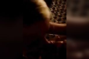 Pigtailed golden-haired coed kneels in front of me to engulf my weenie