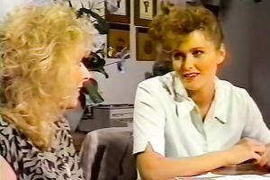 Two prostitutes share a jock in retro FFM three-some scene