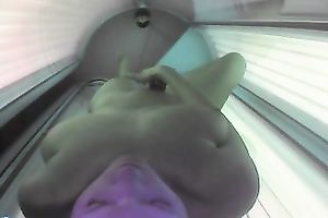 Sex-starved doxy with admirable bumpers is playing with her cunt in solarium