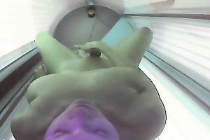 Sex-starved doxy with admirable bumpers is playing with her cunt in solarium