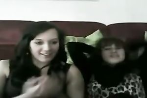 Two laughable dark brown gals dance merely for me on cam