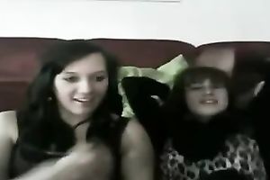 Two laughable dark brown gals dance merely for me on cam