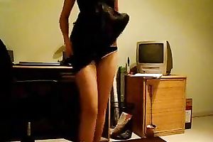 Slender cam model disrobes bare and then masturbates