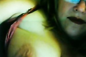 Lewd fair-haired milf licks her big jugs in front of a livecam