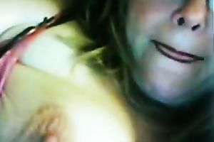 Lewd fair-haired milf licks her big jugs in front of a livecam