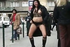 My dark-haired excited wife flahes her goodies in public