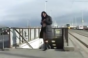 My dark-haired excited wife flahes her goodies in public