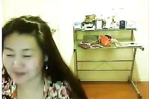 Webcam solo with a shy Asian horny white wife flashing her natural tits