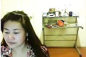 Webcam solo with a shy Asian horny white wife flashing her natural tits