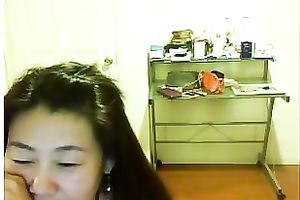Webcam solo with a shy Asian horny white wife flashing her natural tits