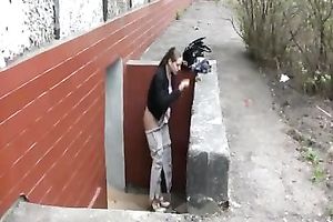 Outdoor piddle fetish scene with long-haired horny white wife OLga