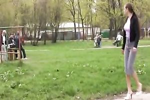 Outdoor piddle fetish scene with long-haired horny white wife OLga