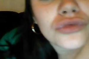 Joyful big beautiful woman dark brown chick plays with her privates on webcam