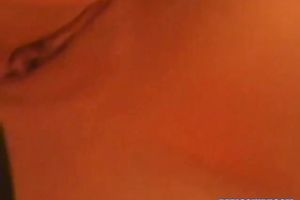 Kinky nympho with big pantoons bonks her taut slit with her dildo