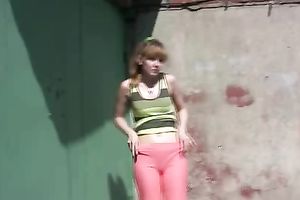 Slim dirty slut wife pees in her legging during the time that walking in the street