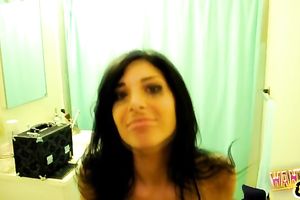 Big breasted dark brown cutie disrobes undressed for the camera