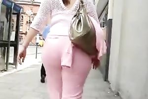 Massive and hot wazoo of golden-haired playgirl wearing pink taut trousers walk down the street