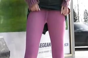 Amateur Russian college girl in purple leggings pees in public