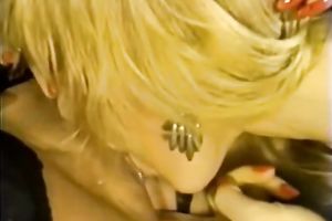 Two lesbo paramours in fishnet stockings and underware