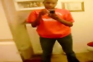 Stripping and masturbating ardently in front of a mirror