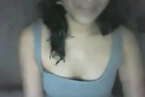 Amateur brunette hair shows her tits and gazoo for the web camera