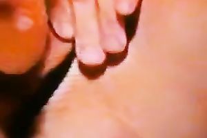 A lustful doxy pulls her strap aside and toys her bald bawdy cleft