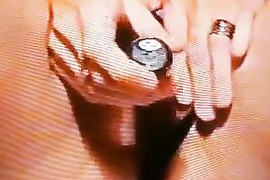 A lustful doxy pulls her strap aside and toys her bald bawdy cleft