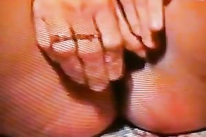 A lustful doxy pulls her strap aside and toys her bald bawdy cleft