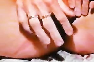 A lustful doxy pulls her strap aside and toys her bald bawdy cleft