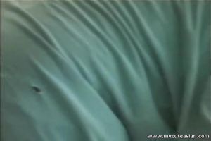 Sex-starved Asian chick poses for the camera and then this babe masturbates