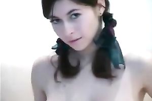 Super well-endowed brunette hair legal age teenager boasts of her body in web camera solo
