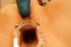 Horny honey receives a speculum in her taut slit and demonstrates all this babe got