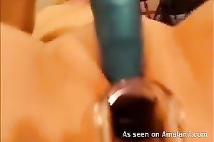 Horny honey receives a speculum in her taut slit and demonstrates all this babe got