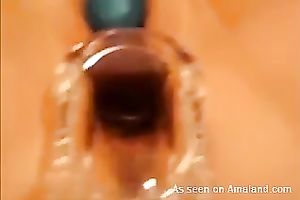 Horny honey receives a speculum in her taut slit and demonstrates all this babe got