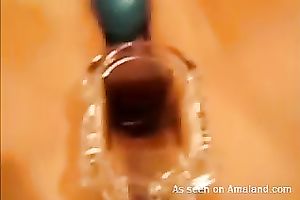 Horny honey receives a speculum in her taut slit and demonstrates all this babe got