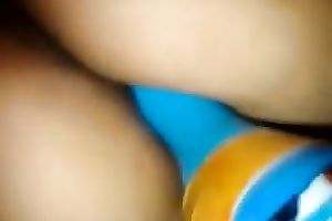 Stuffing a big bottle in the soaked brown cunt of my latin chick girlfriend