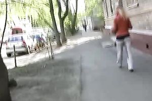 Salacious golden-haired Irina pees her panties in the sreet