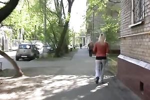 Salacious golden-haired Irina pees her panties in the sreet