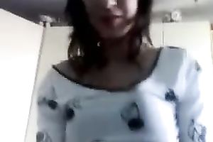 She begins playing with my ramrod and makes me cum on cam