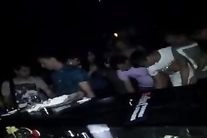 Sexy non-professional girl disrobes and dances during a party