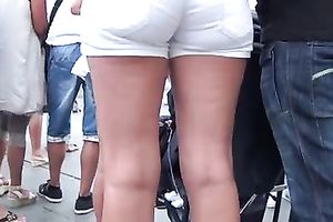 Cuties with terrific butts acquire caughty on hidden livecam in the street