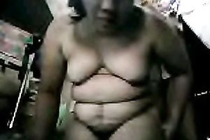 This obese floozy is an exhibitionist and she can't live without to show of her in nature's garb body